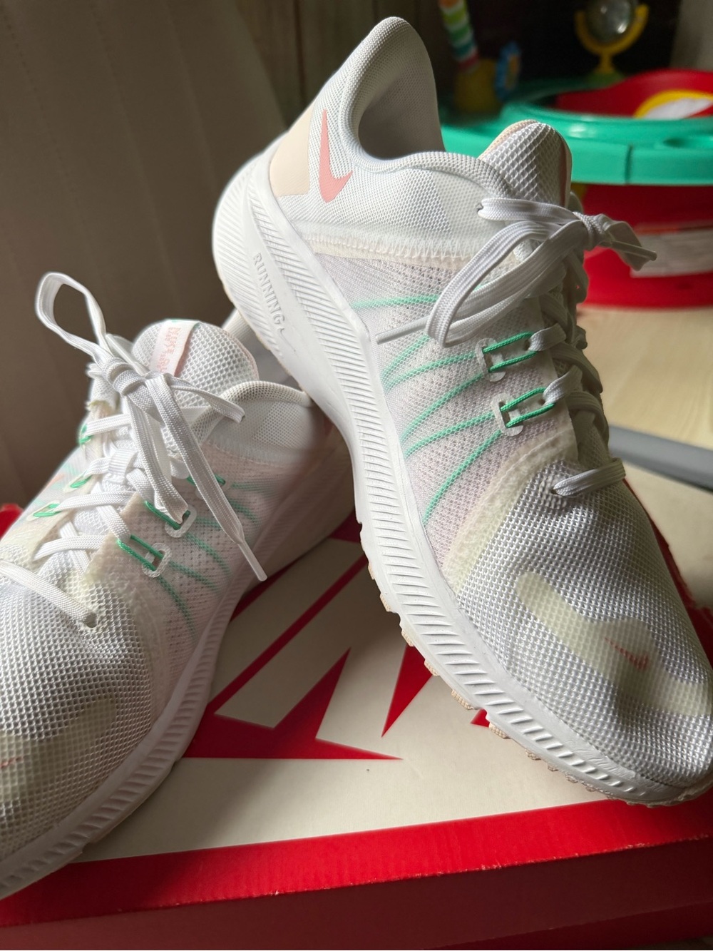 Nike Women's White Running Shoes with Mint and Coral Accents
